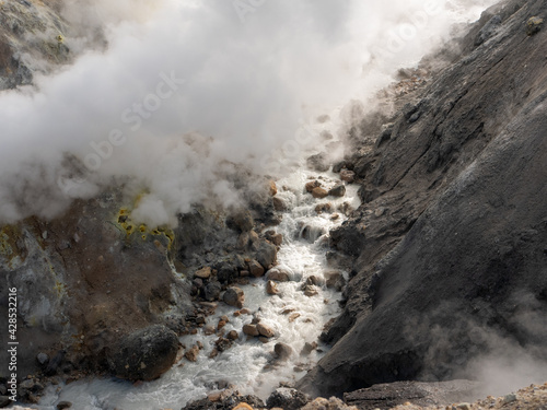 Fumaroles of the Mutnovsky volcano. Fumaroles of the Mutnovsky volcano. Close-up of a dangerous vapor of fumaroles emanating from a volcanic rift in the earth. Kamchatka Peninsula, Russia.