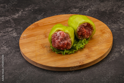 Raw stuffed pepper for cooking