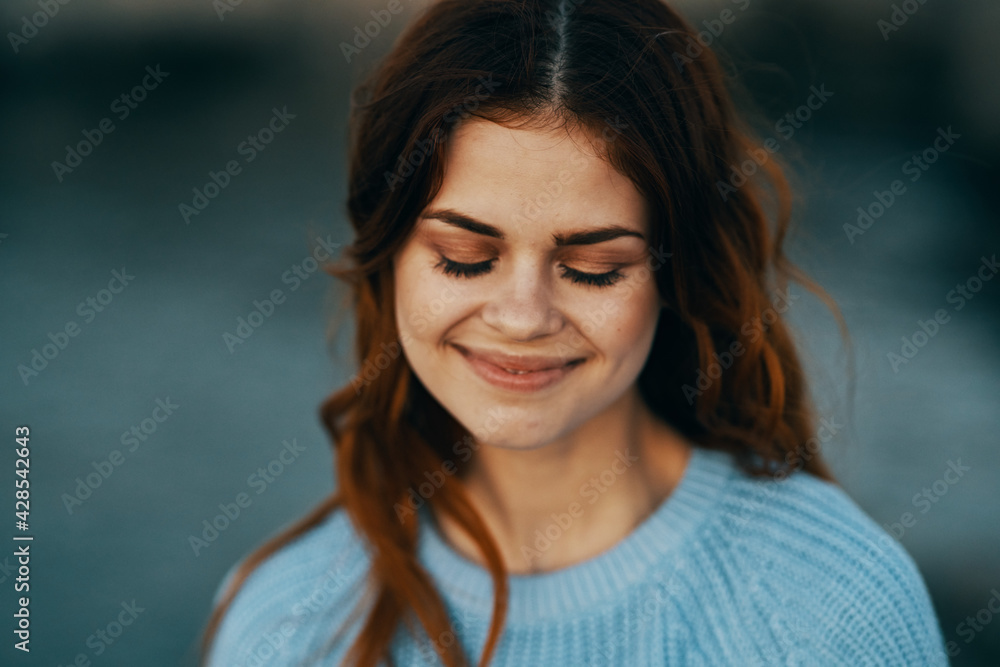 attractive red-haired woman outdoors travel glamor fresh air attractive red-haired woman outdoors travel glamor fresh air