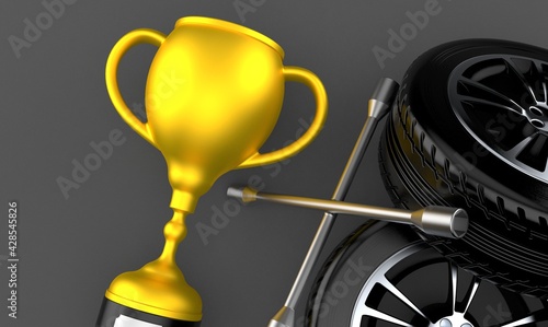 Golden trophy with car tire and wrench