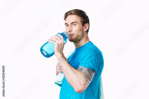 sports man blue t shirt water bottle thirst fitness