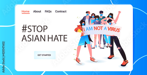 stop asian hate activists in masks protesting against racism support people during coronavirus pandemic concept