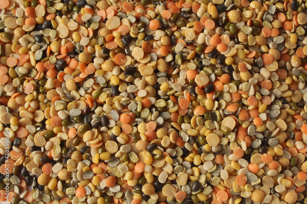 A bowl of mixed lentils that are widely used in India. Lentils are Red lentil, Mung bean, Black gram, Pigeon pea, and split Chickpea. A bowl of mixed lentils that are widely used in India. Lentils are Red lentil, Mung bean, Black gram, Pigeon pea, and split Chickpea.