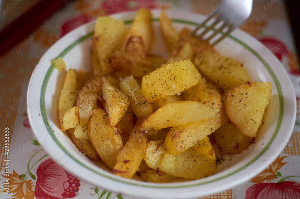 Photo of fried potatoes in a bowl Photo of fried potatoes in a bowl
