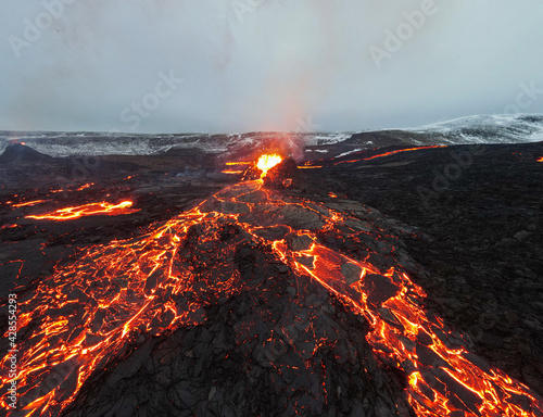 lava eruption volcano aerial view
drone view from Iceland of Hot lava and magma coming out of the crater, April 2021 
