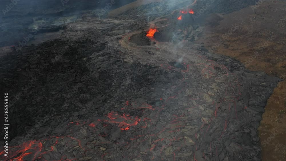 Lava Flows on active volcano aerial view, Mount Fagradalsfjall, Iceland
4K drone shot from Iceland of Hot lava and magma coming out of the crater, April 2021
Lava Flows on active volcano aerial view, Mount Fagradalsfjall, Iceland
4K drone shot from Iceland of Hot lava and magma coming out of the crater, April 2021