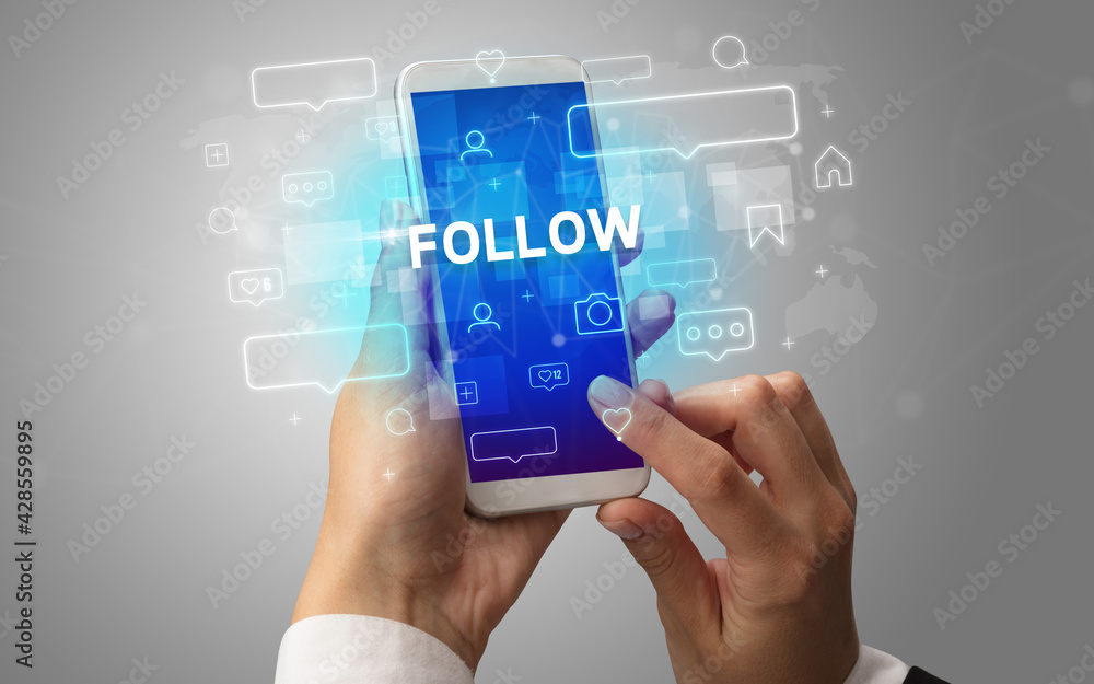 Hand using smartphone with social media concept Hand using smartphone with social media concept