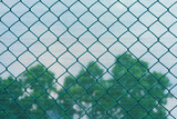 green wire mesh of fence background