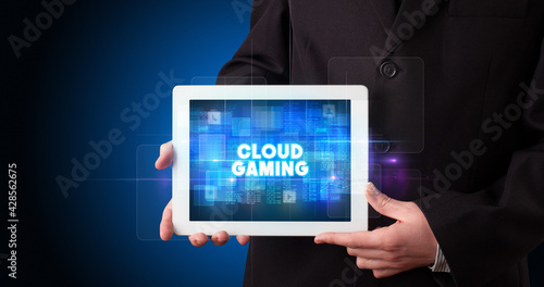 Wallpaper Mural Person holding tablet, technology concept Torontodigital.ca