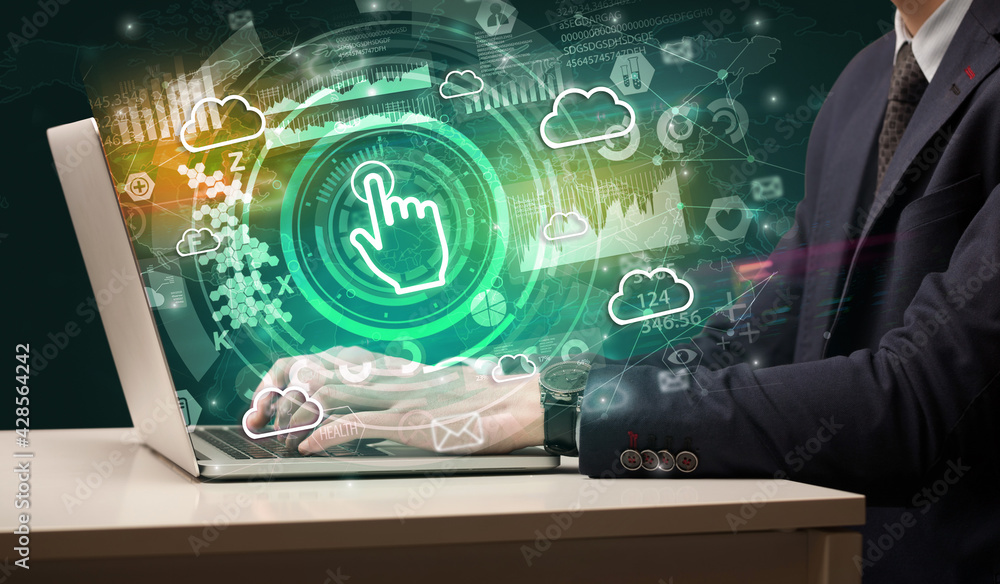 Business hand typing on a modern laptop Business hand typing on a modern laptop