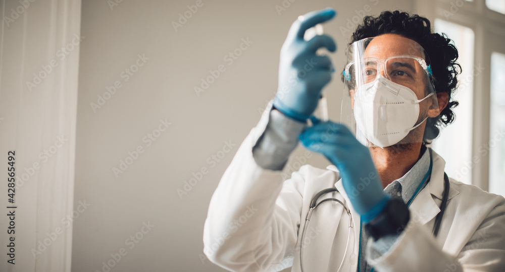 Healthcare worker preparing vaccine injection Healthcare worker preparing vaccine injection