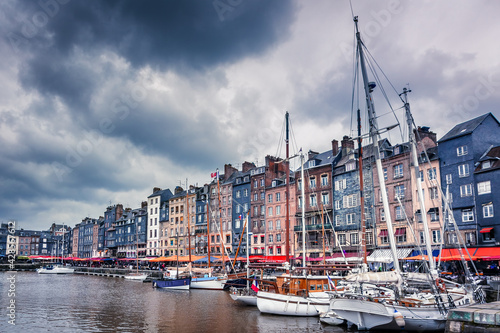 Canvas Print Honfleur, Normandy, France. Boats and colored buildings