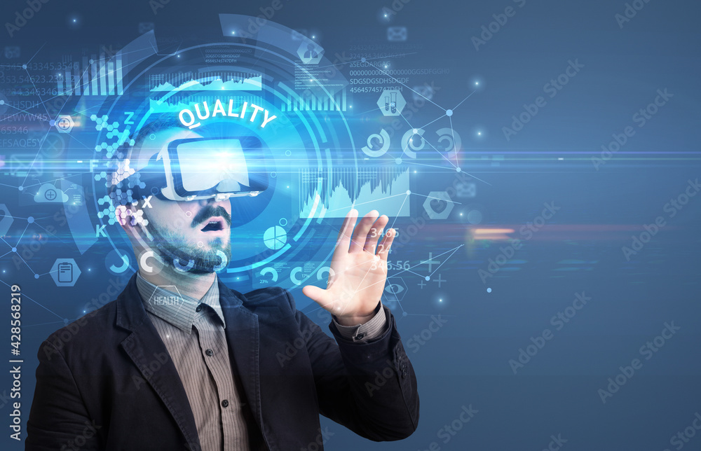 Businessman looking through VR glasses Businessman looking through VR glasses