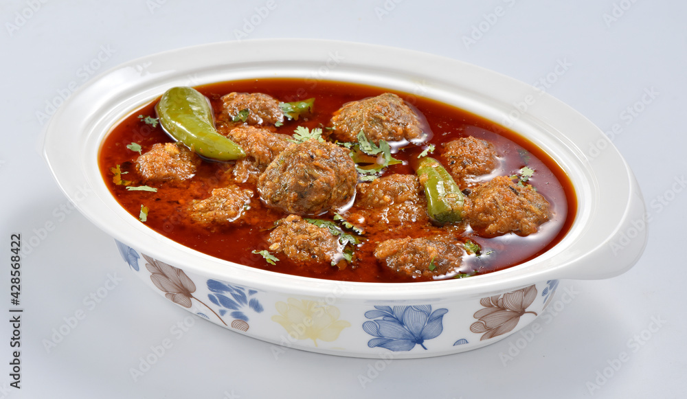 Kofta Curry, Delicious and spicy meat balls cooked in spicy thick gravy. Famous cuisine of Pakistan and India Kofta Curry, Delicious and spicy meat balls cooked in spicy thick gravy. Famous cuisine of Pakistan and India