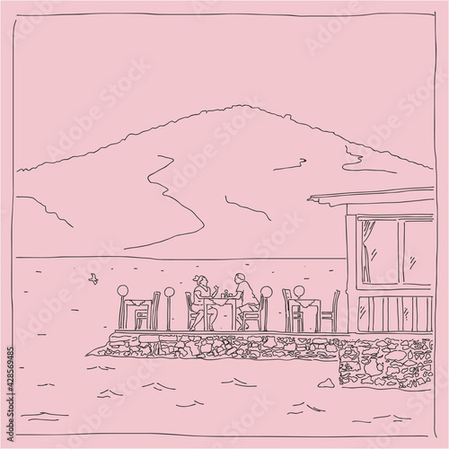 Two people are sitting in a restaurant
