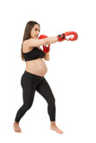 Pregnant woman doing fitness exercises