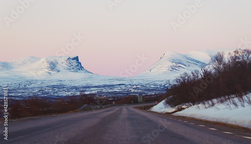 snow covered mountain in winter. Road in the mountains