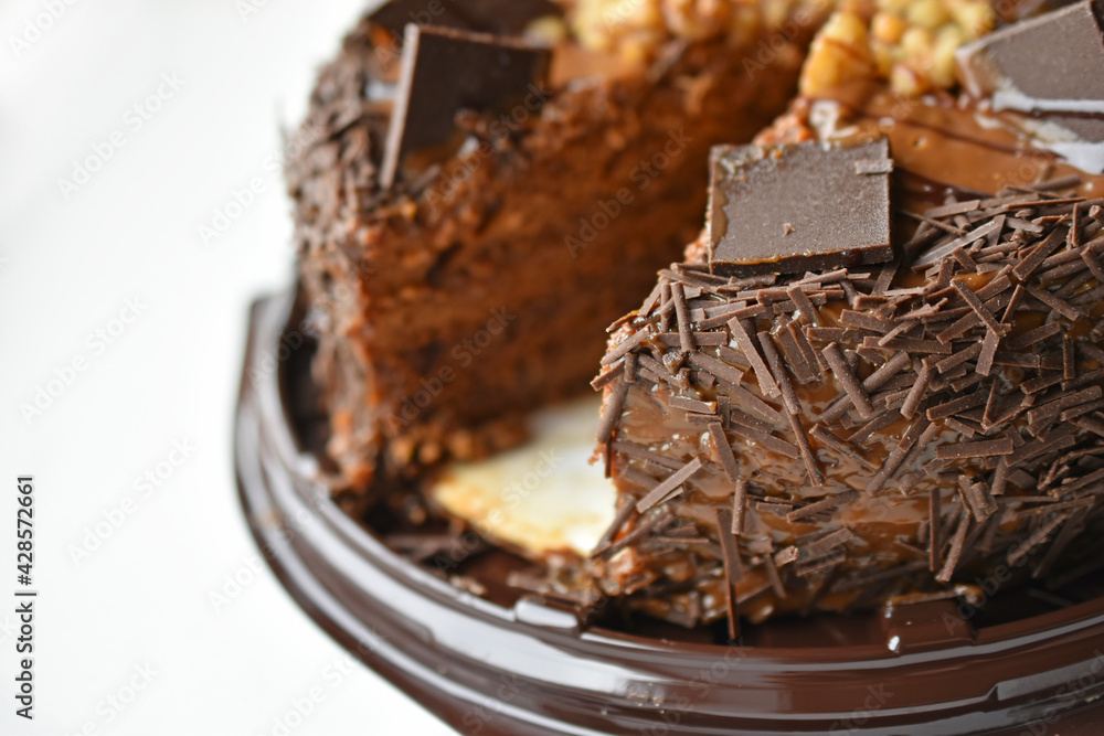 Delicious chocolate cake with nuts and butter Delicious chocolate cake with nuts and butter