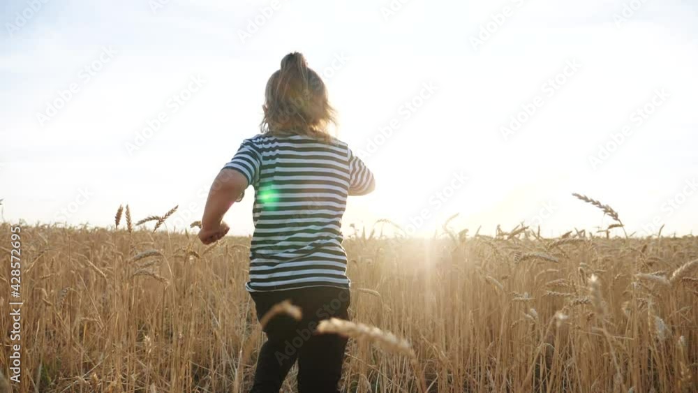 child kid together run in the park wheat field silhouette sunset. happy family people in the park concept. daughter joyful run. little baby child fun summer kid dream wheat field concept child kid together run in the park wheat field silhouette sunset. happy family people in the park concept. daughter joyful run. little baby child fun summer kid dream wheat field concept