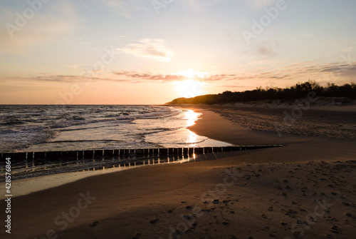 Fototapeta Naklejka Na Ścianę i Meble -  Dziwnów 04/17/2021 Beach on the Baltic Sea near Dziwnów, north-western Poland