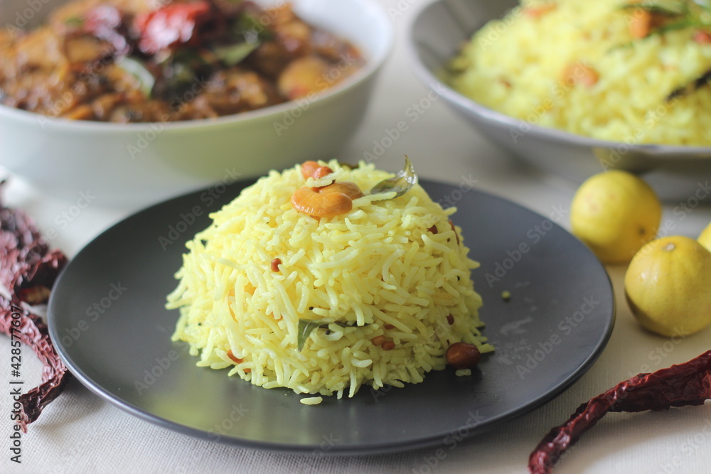 Homemade Lemon rice served with Kerala style chicken curry Homemade Lemon rice served with Kerala style chicken curry
