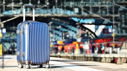 Ttravel suitcase on the railroad platform