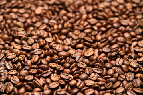 Background or texture made of roasted brown coffee beans