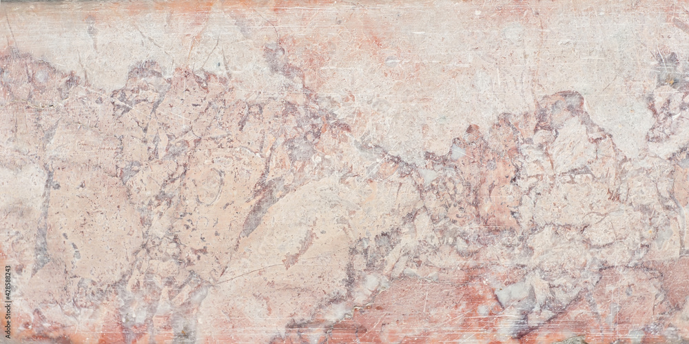 Texture of red and yellow marble. Stone tile with natural pattern. Marble pavement closeup.