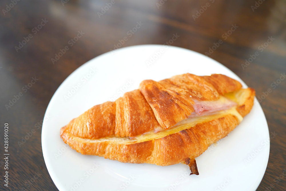 fresh croissant on a plate	

