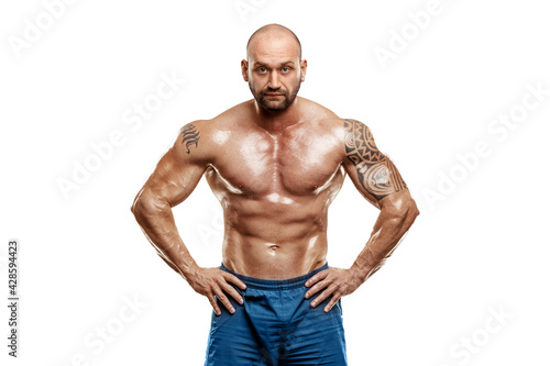 Male bodybuilder isolated on white background. Fitness workout concept, muscle groups, watch your body.