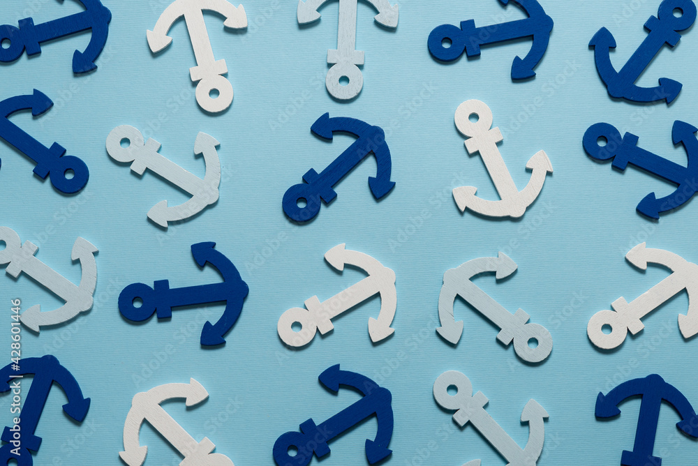 Blue anchors on a blue background. Blue anchors on a blue background.