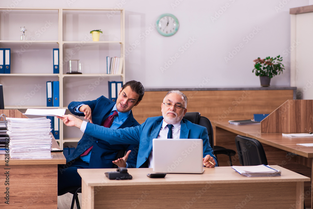 custom made wallpaper toronto digitalOld male boss and his young male assistant in bullying concept