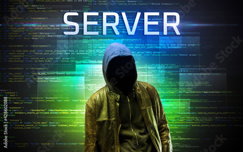 Faceless hacker on code background