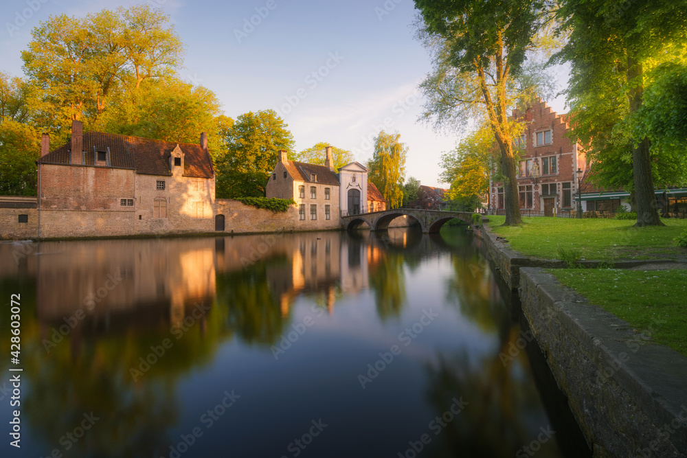 Bruges canals at sunrise. Brugge, Belgium Bruges canals at sunrise. Brugge, Belgium