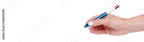 Hand with glossy ballpoint pen  isolated on white background.