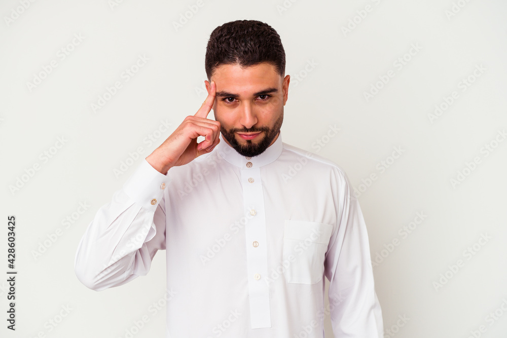 Young arab man wearing typical arab clothes isolated on white background Young arab man wearing typical arab clothes isolated on white background