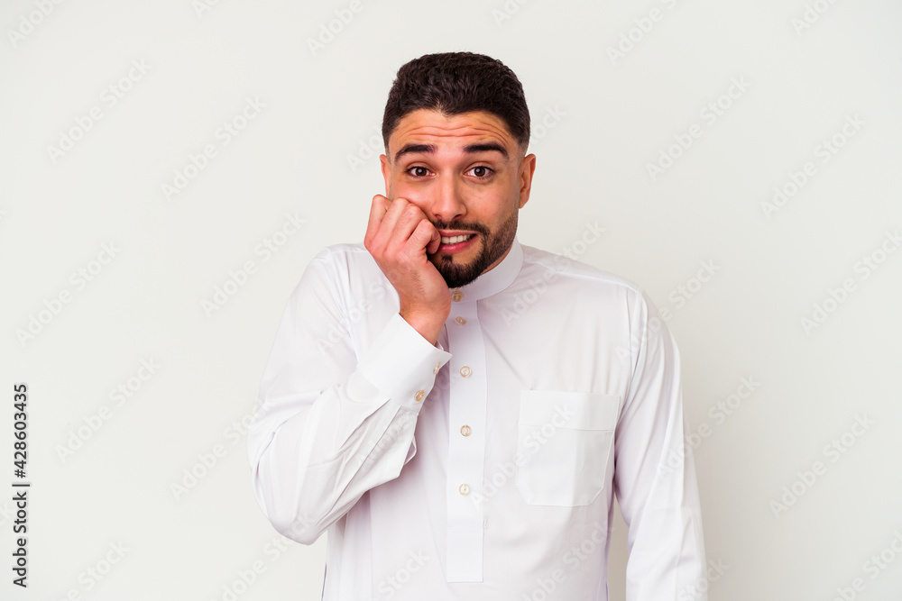 Young arab man wearing typical arab clothes isolated on white background Young arab man wearing typical arab clothes isolated on white background
