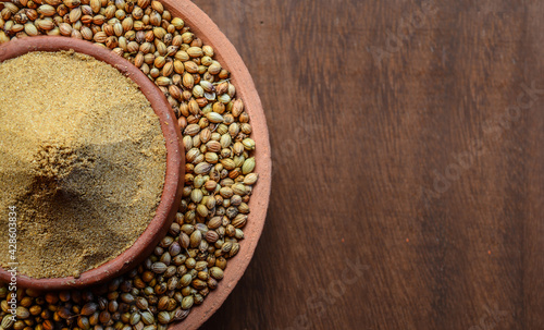 Raw Coriander with powdered coriander still life photograph