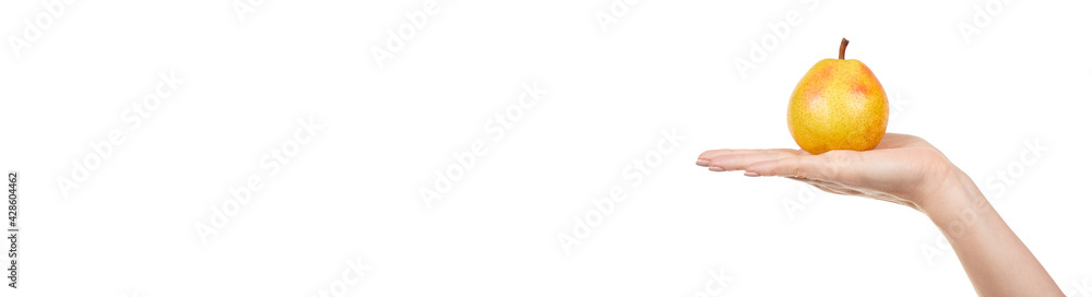 Hand with fresh yellow pear isolated on white background. Hand with fresh yellow pear isolated on white background.