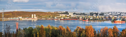 Golden autumn. View of the city of Murmansk and the port (panorama) Murmansk seaport is the only non-freezing Northern port of Russia, and only because the Gulf Stream enters the Kola Bay (Barents Sea