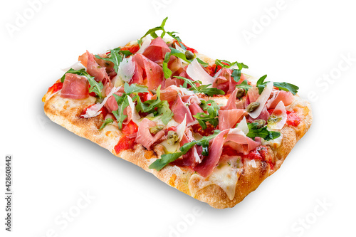 Sorrentina pizza with prosciutto, arugula, capers, pelati sauce, pesto. Roman pizza rectangular on white background