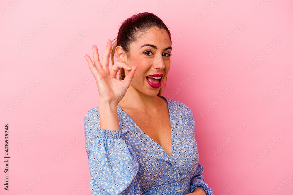 Young caucasian woman isolated on pink background Young caucasian woman isolated on pink background