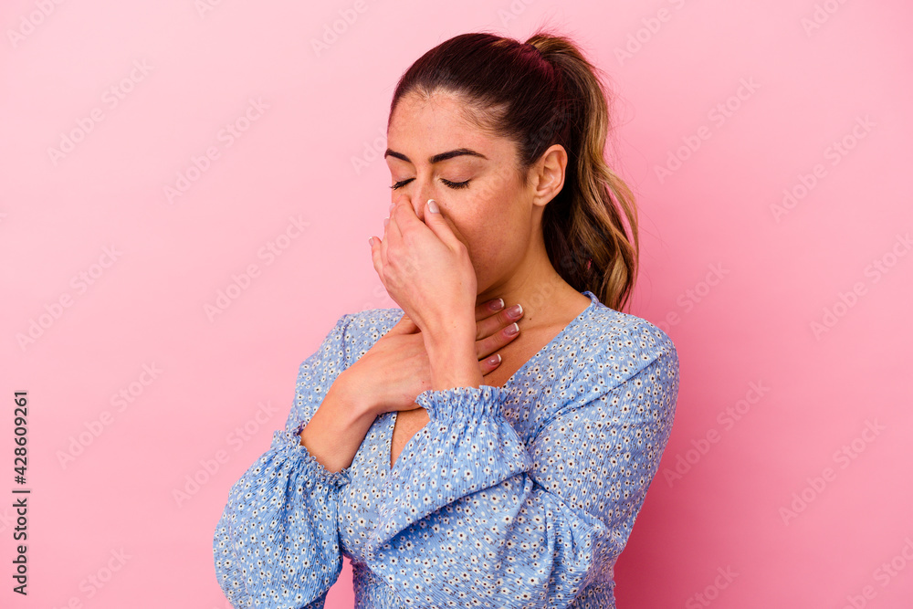 Young caucasian woman isolated on pink background Young caucasian woman isolated on pink background