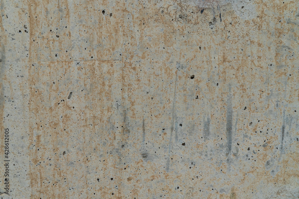 Yellow stain on  abstract blank gray cement concrete texture wall for background and wallpaper with copy space.