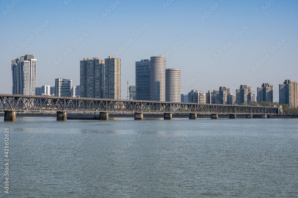 Landscape of Qiantang River Bridge and modern city skyline in Hangzhou, China Landscape of Qiantang River Bridge and modern city skyline in Hangzhou, China