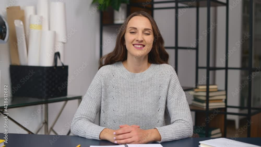 Online job interview concept. Video chat with a smiling young woman in casual wear, a female job seeker introducing herself on the distance. A colleague looks at the camera and talking, video call Online job interview concept. Video chat with a smiling young woman in casual wear, a female job seeker introducing herself on the distance. A colleague looks at the camera and talking, video call