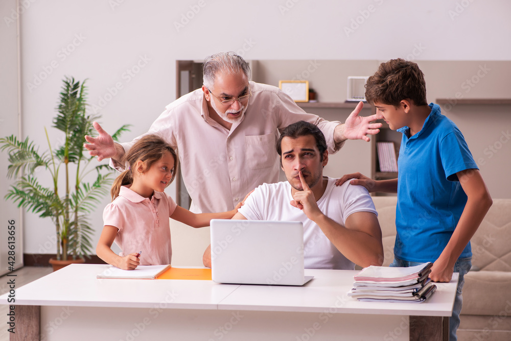 Obraz premium Three generations at home during pandemic