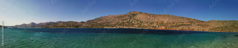 Beautiful blue sea landscape against hill formed as island panorama of Crete, Greece, Europe