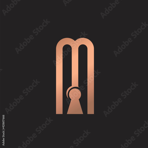 Metallic golden abstract key hole logo concept vector. Letter M with keyhole logo