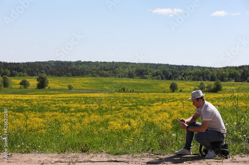 Young man travels with a backpack